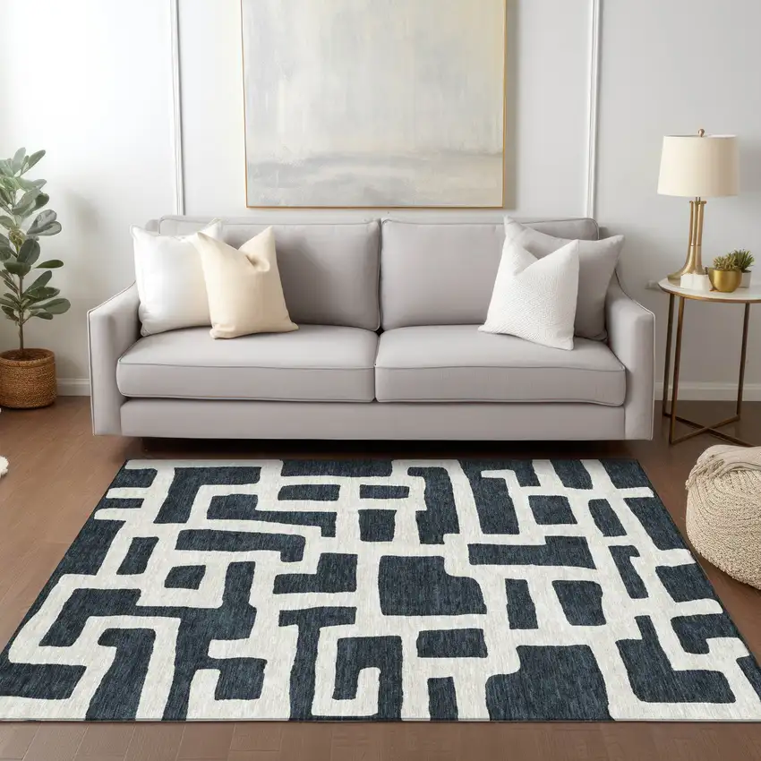 Black And Ivory Abstract Washable Indoor Outdoor Area Rug Photo 9