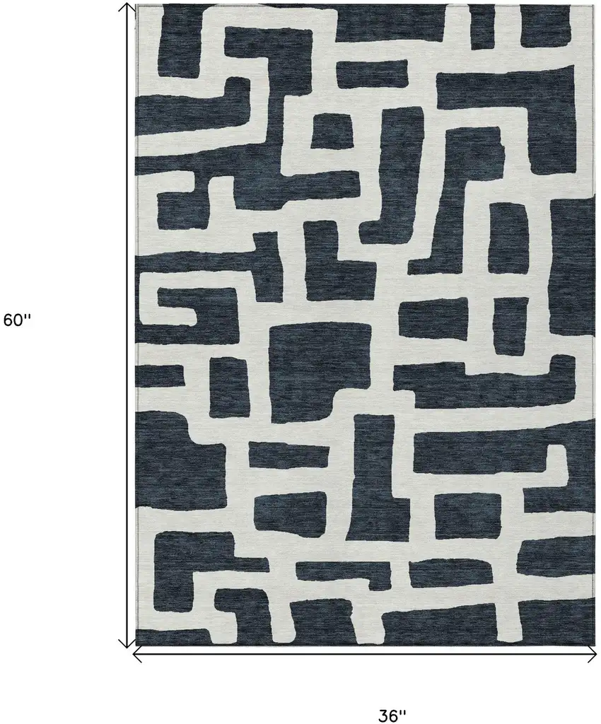 Black And Ivory Abstract Washable Indoor Outdoor Area Rug Photo 3