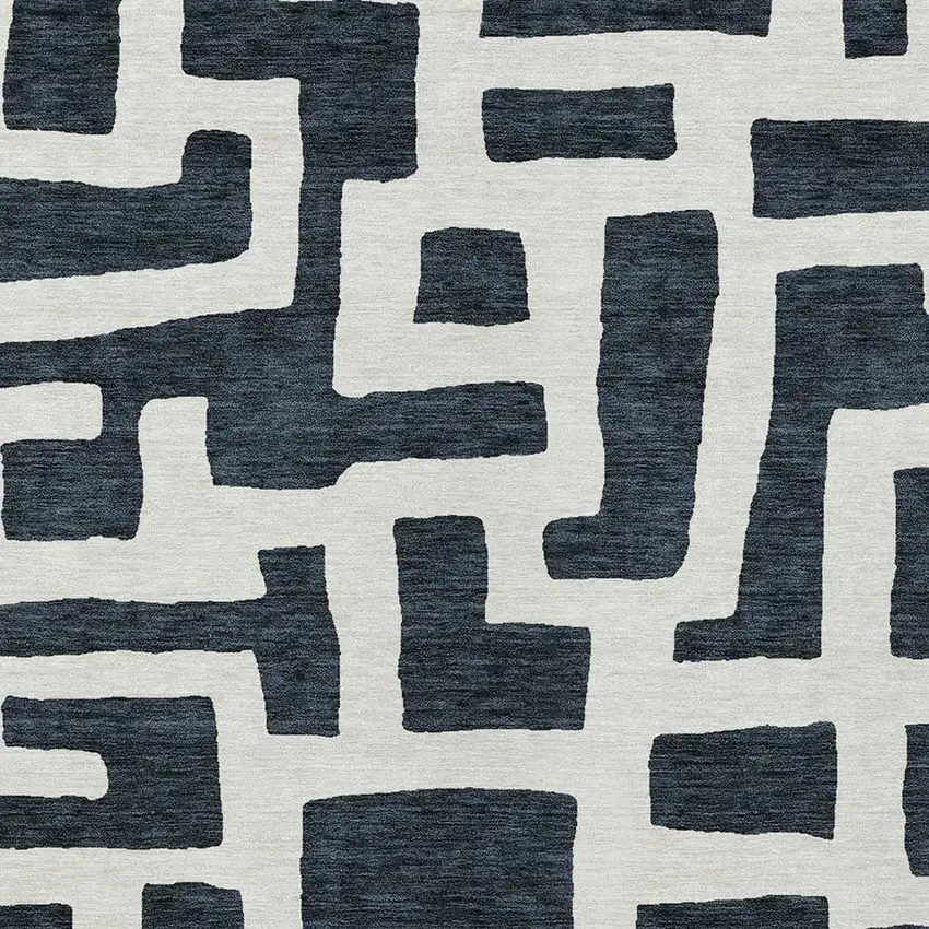 Black And Ivory Abstract Washable Indoor Outdoor Area Rug Photo 6