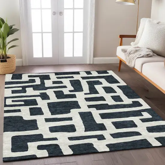 Black And Ivory Abstract Washable Indoor Outdoor Area Rug Photo 9