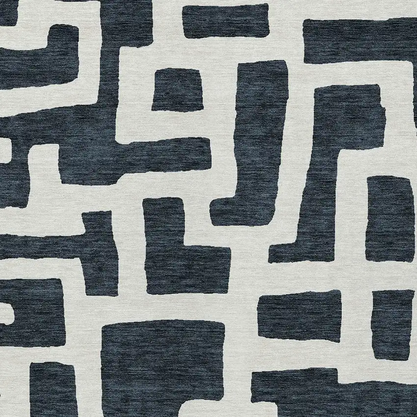 Black And Ivory Abstract Washable Indoor Outdoor Area Rug Photo 6