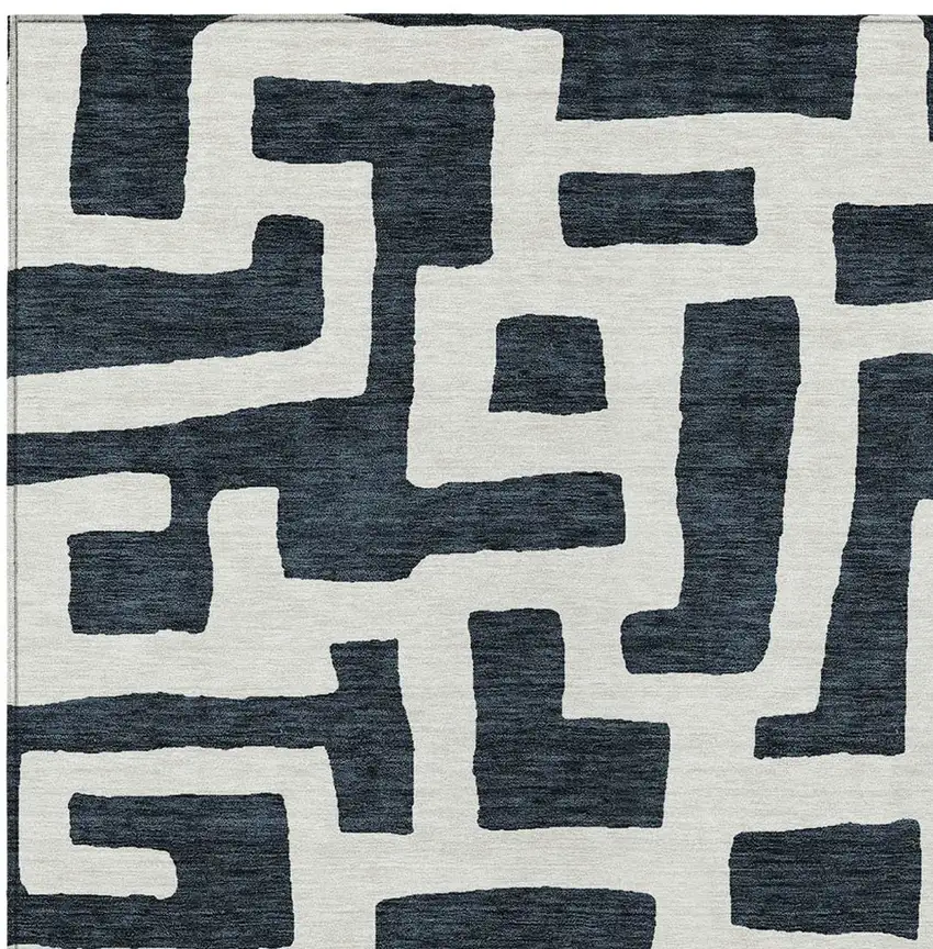 Black And Ivory Abstract Washable Indoor Outdoor Area Rug Photo 6