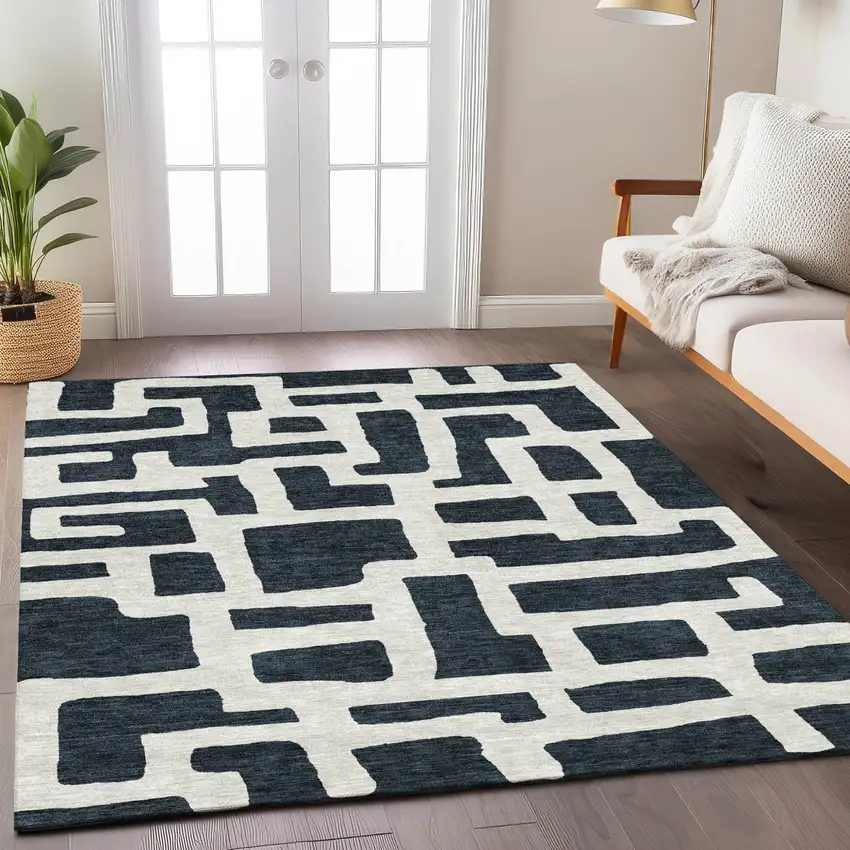 Black And Ivory Abstract Washable Indoor Outdoor Area Rug Photo 9