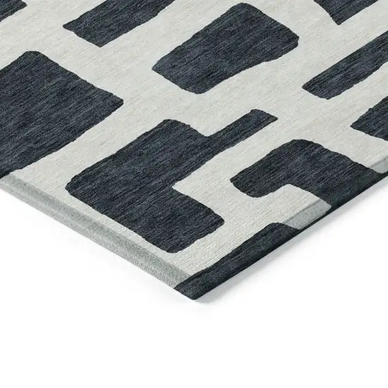 Black And Ivory Abstract Washable Indoor Outdoor Area Rug Photo 5