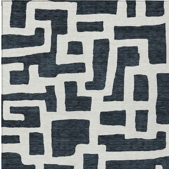 Black And Ivory Abstract Washable Indoor Outdoor Area Rug Photo 7