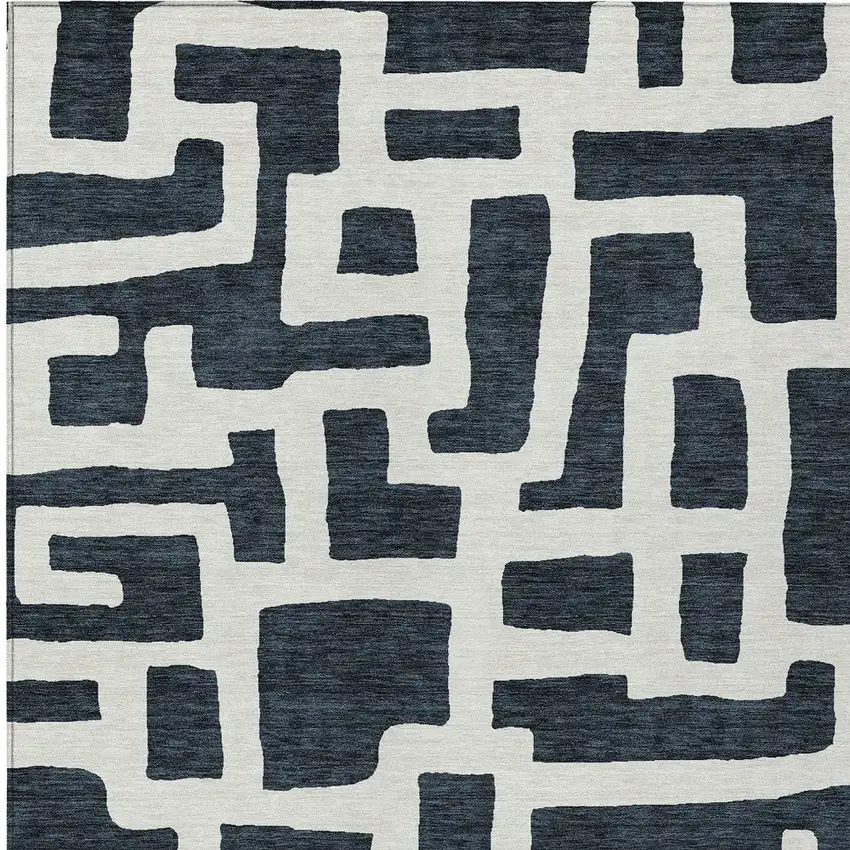 Black And Ivory Abstract Washable Indoor Outdoor Area Rug Photo 7
