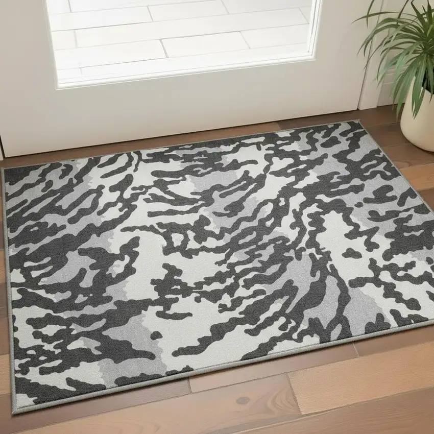 Black And Ivory Animal Print Washable Area Rug With UV Protection Photo 2