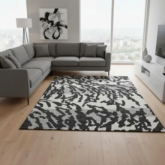 Black And Ivory Animal Print Washable Area Rug With UV Protection Photo 2
