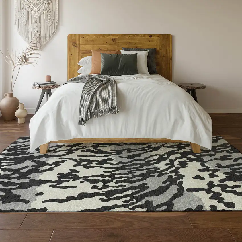 Black And Ivory Animal Print Washable Area Rug With UV Protection Photo 6