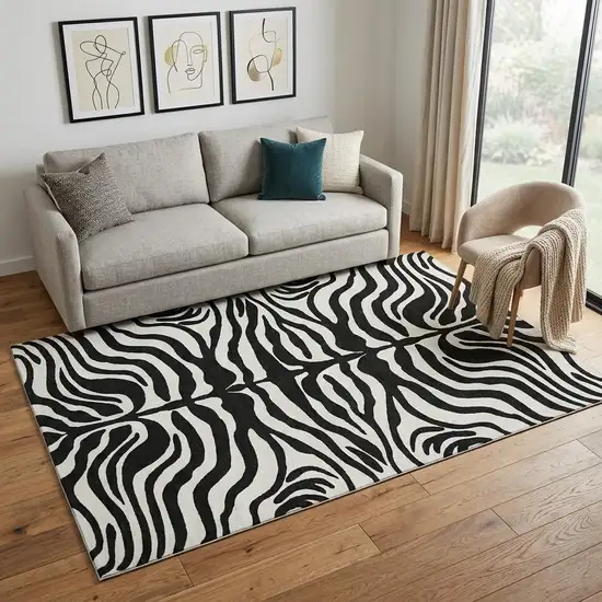 Black And Ivory Animal Print Washable Area Rug With UV Protection Photo 1