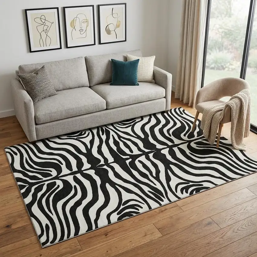 Black And Ivory Animal Print Washable Area Rug With UV Protection Photo 1