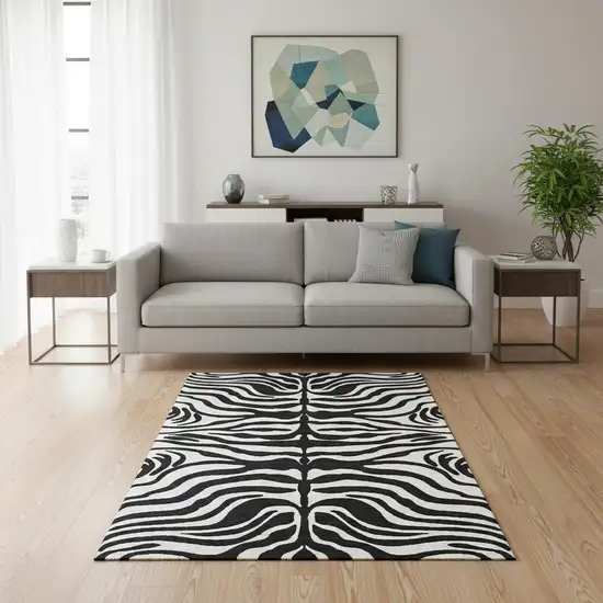 Black And Ivory Animal Print Washable Area Rug With UV Protection Photo 2