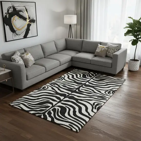 Black And Ivory Animal Print Washable Area Rug With UV Protection Photo 2
