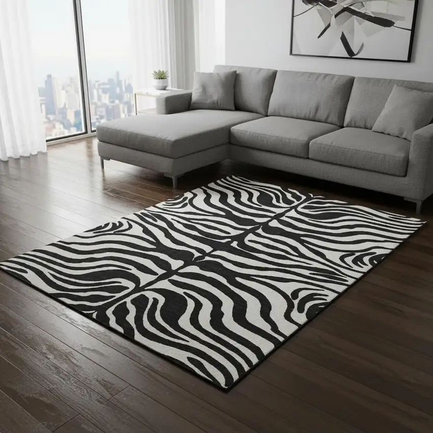 Black And Ivory Animal Print Washable Area Rug With UV Protection Photo 2