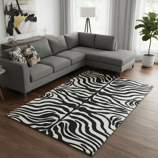 Black And Ivory Animal Print Washable Area Rug With UV Protection Photo 2