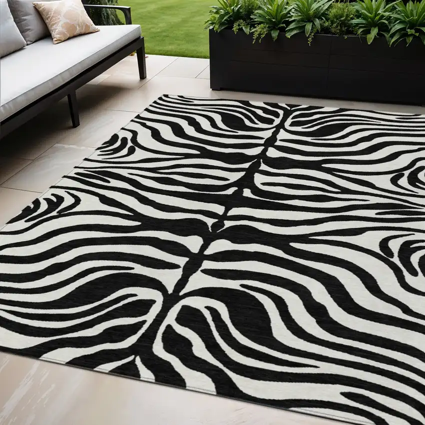 Black And Ivory Animal Print Washable Indoor Outdoor Area Rug Photo 1