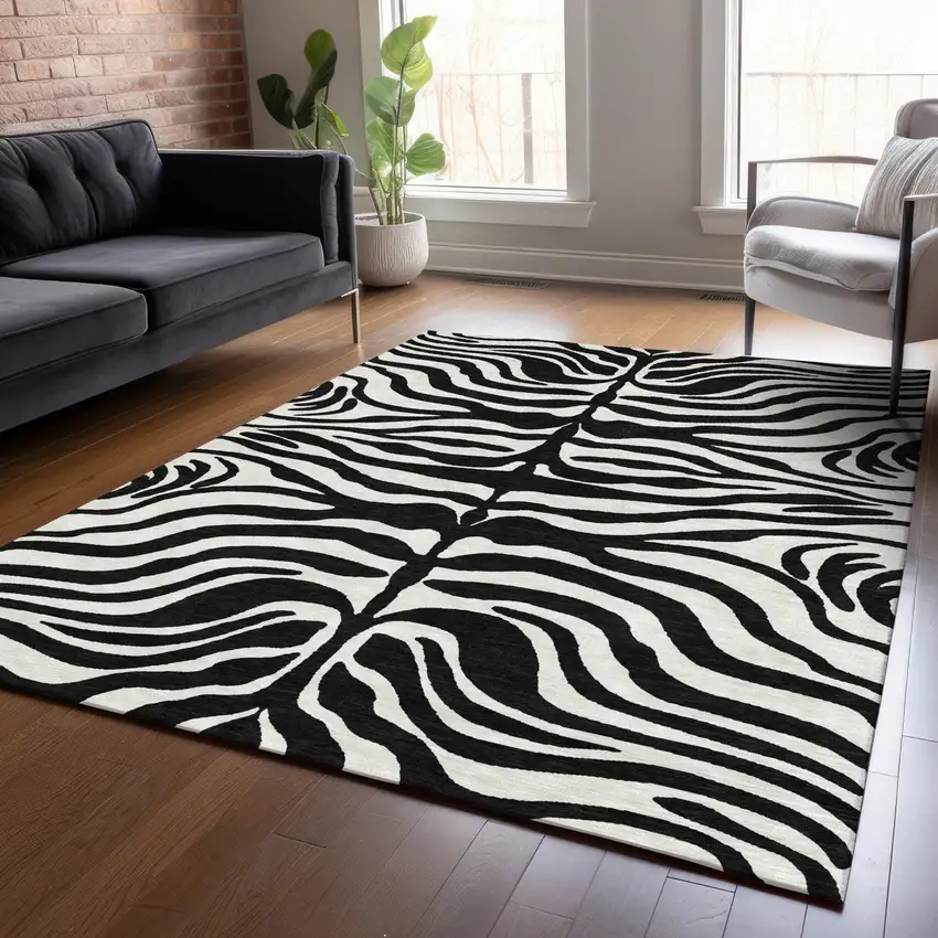 Black And Ivory Animal Print Washable Indoor Outdoor Area Rug Photo 9