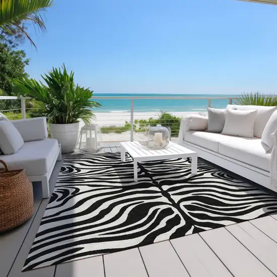 Black And Ivory Animal Print Washable Indoor Outdoor Area Rug Photo 8