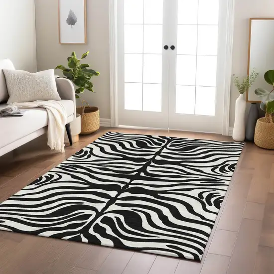 Black And Ivory Animal Print Washable Indoor Outdoor Area Rug Photo 9