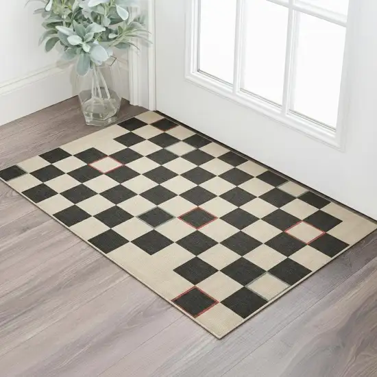 Black And Ivory Checkered Area Rug Photo 1