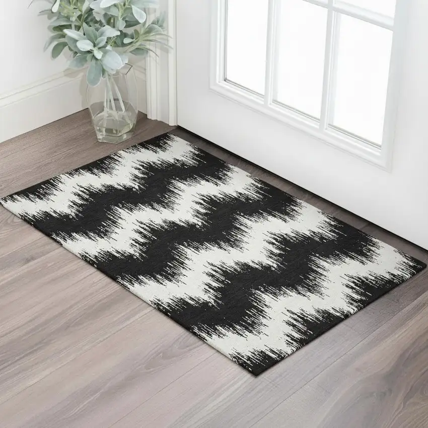 Black And Ivory Chevron Washable Area Rug With UV Protection Photo 1