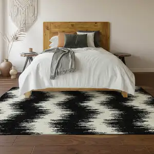 Photo of Black And Ivory Chevron Washable Area Rug With UV Protection