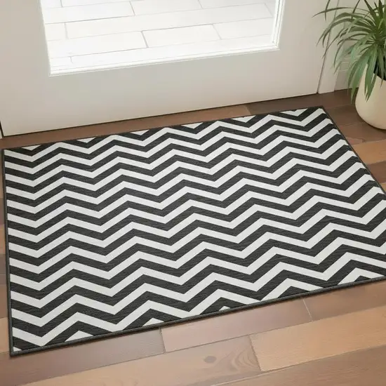 Black And Ivory Chevron Washable Area Rug With UV Protection Photo 2