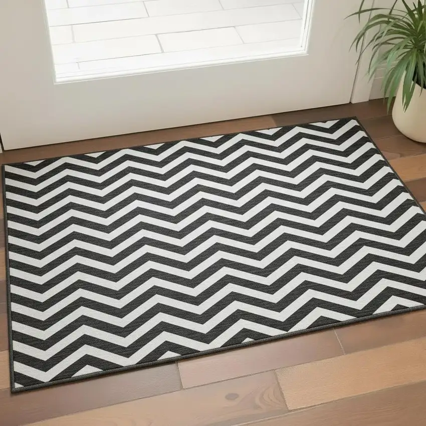 Black And Ivory Chevron Washable Area Rug With UV Protection Photo 2