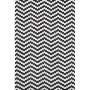 Photo of Black And Ivory Chevron Washable Area Rug With UV Protection