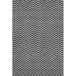 Photo of Black And Ivory Chevron Washable Area Rug With UV Protection