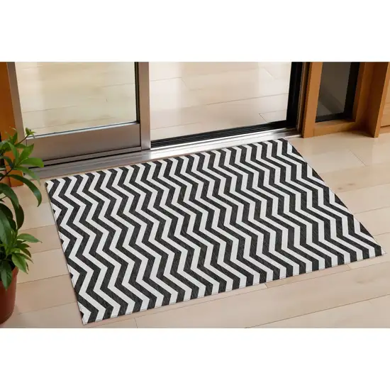 Black And Ivory Chevron Washable Indoor Outdoor Area Rug Photo 1