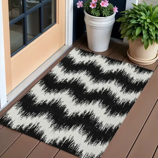 Black And Ivory Chevron Washable Indoor Outdoor Area Rug Photo 1