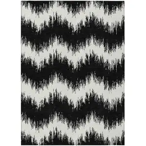 Photo of Black And Ivory Chevron Washable Indoor Outdoor Area Rug