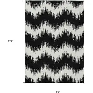 Photo of Black And Ivory Chevron Washable Indoor Outdoor Area Rug