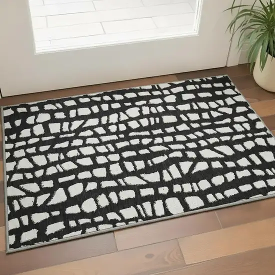 Black And Ivory Cobblestone Washable Area Rug With UV Protection Photo 2