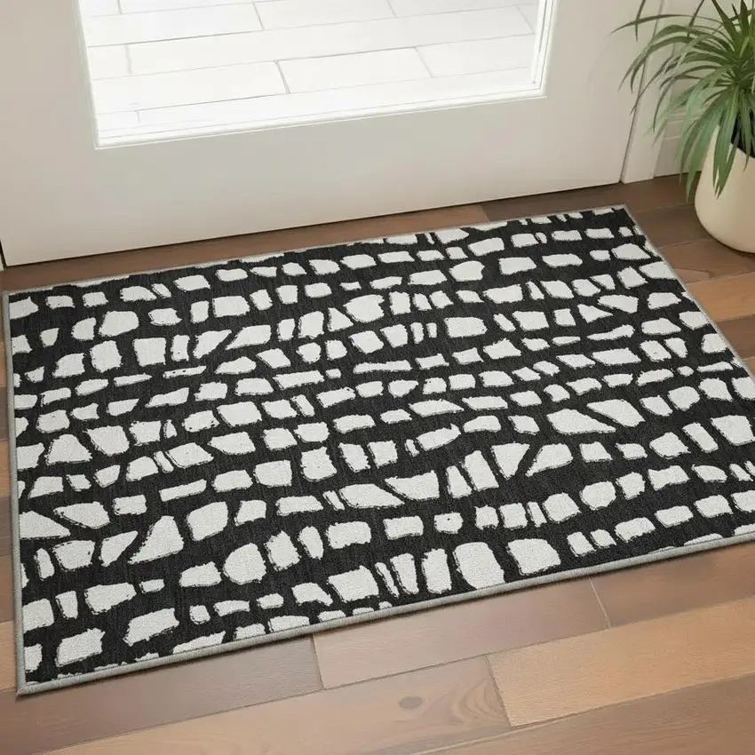Black And Ivory Cobblestone Washable Area Rug With UV Protection Photo 2