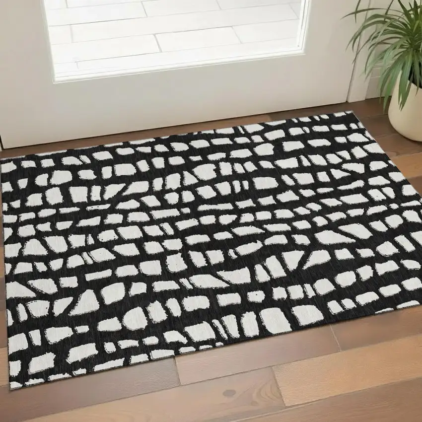Black And Ivory Cobblestone Washable Area Rug With UV Protection Photo 1