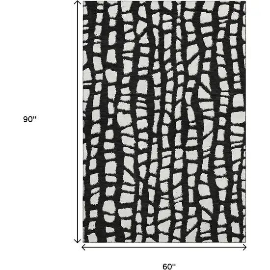 Black And Ivory Cobblestone Washable Area Rug With UV Protection Photo 3