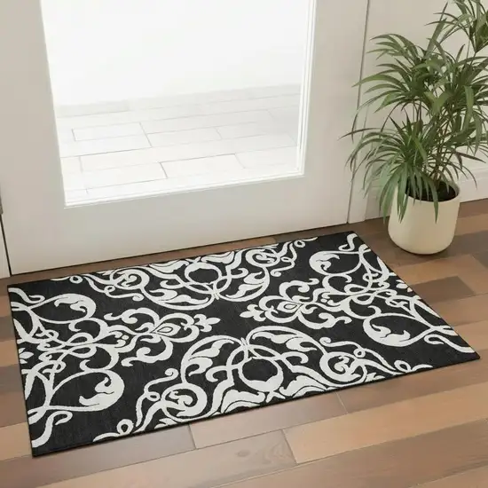 Black And Ivory Damask Washable Area Rug With UV Protection Photo 2
