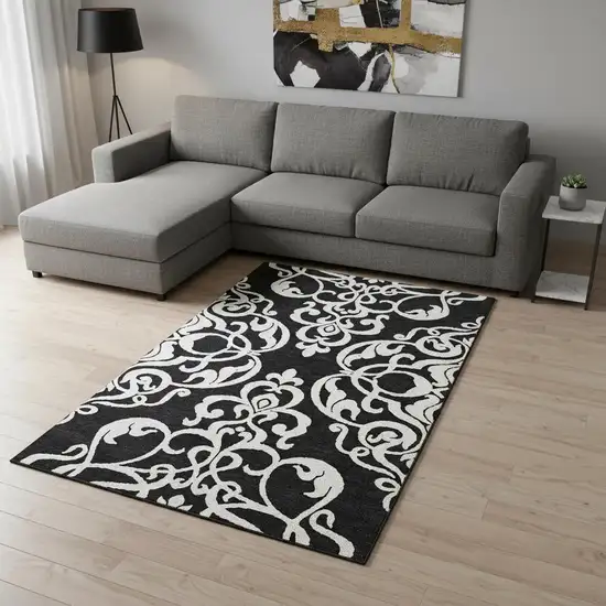Black And Ivory Damask Washable Area Rug With UV Protection Photo 2