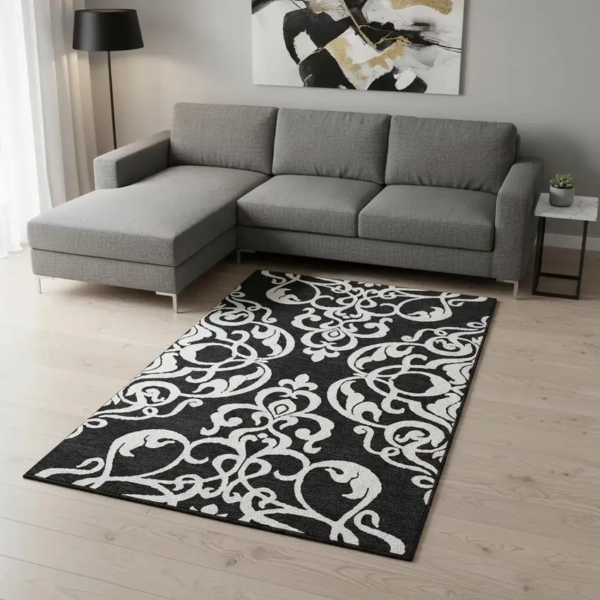 Black And Ivory Damask Washable Area Rug With UV Protection Photo 2