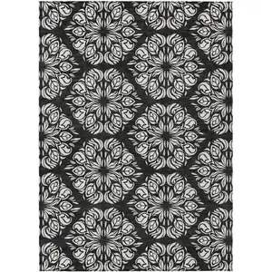 Photo of Black And Ivory Damask Washable Indoor Outdoor Area Rug