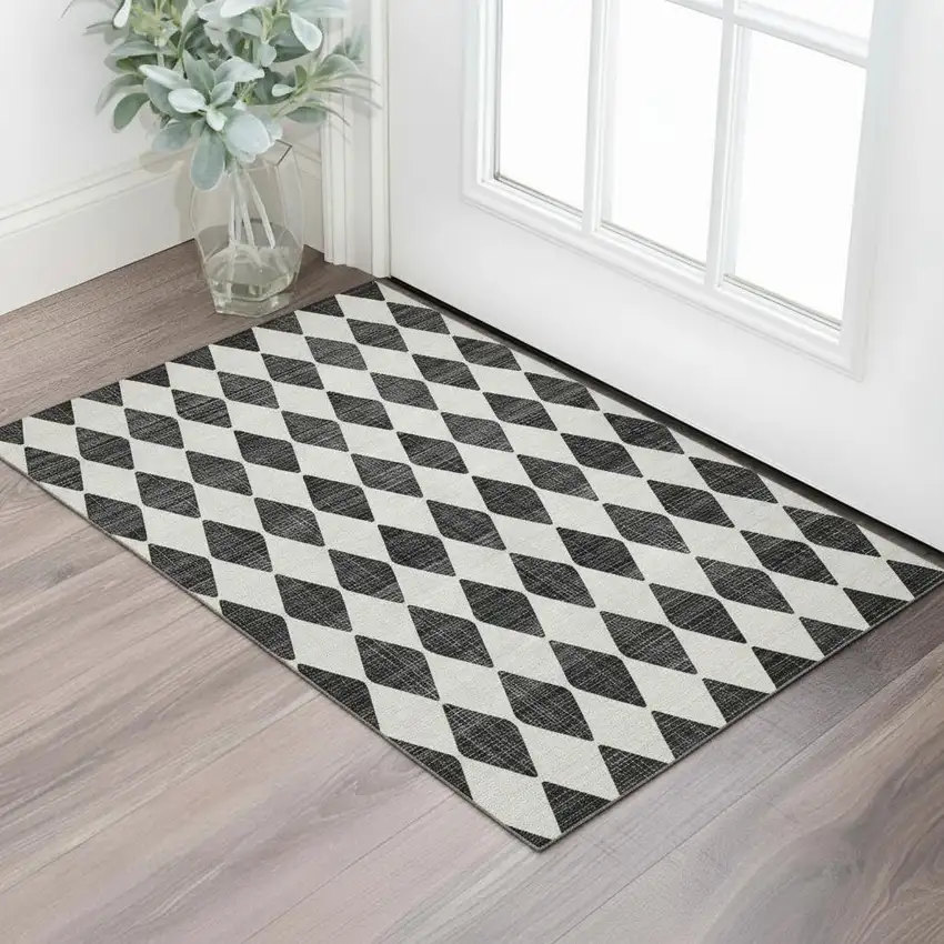 Black And Ivory Diamond Washable Area Rug With UV Protection Photo 1