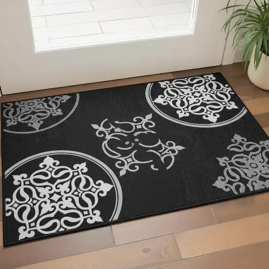 Black And Ivory Floral Medallion Washable Area Rug With UV Protection Photo 2