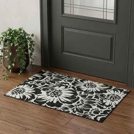 Black And Ivory Floral Washable Area Rug With UV Protection Photo 1
