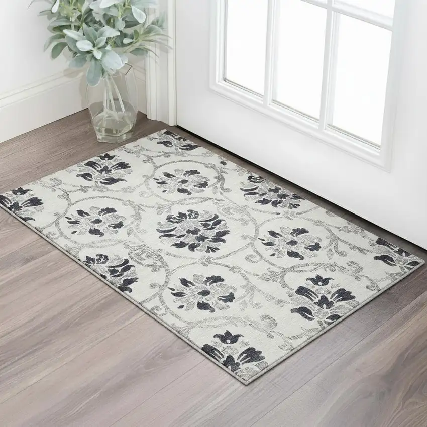 Black And Ivory Floral Washable Area Rug With UV Protection Photo 2