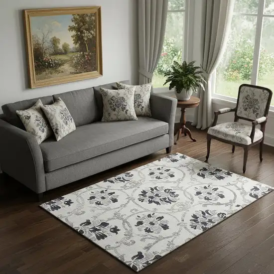 Black And Ivory Floral Washable Area Rug With UV Protection Photo 1
