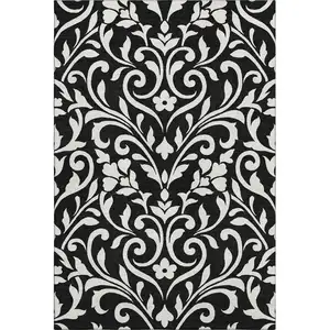 Photo of Black And Ivory Floral Washable Area Rug With UV Protection
