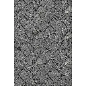 Photo of Black And Ivory Floral Washable Area Rug With UV Protection