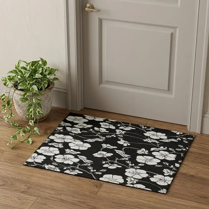Black And Ivory Floral Washable Area Rug With UV Protection Photo 1